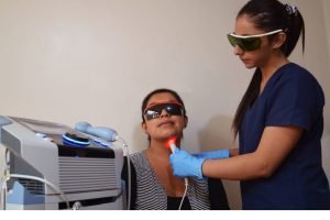 Depressed woman speaking to therapist while she is taking notes